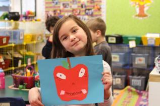 girl smiling with heart 